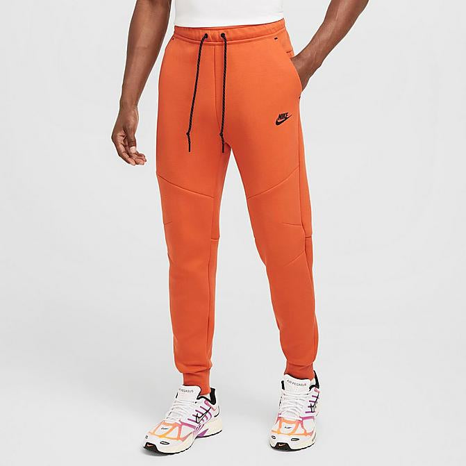 Nike club joggers orange sale